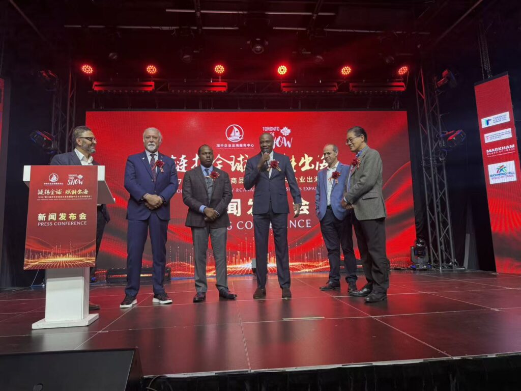 Guests delivering remarks on stage at the Toronto Trade Show 2027 press conference